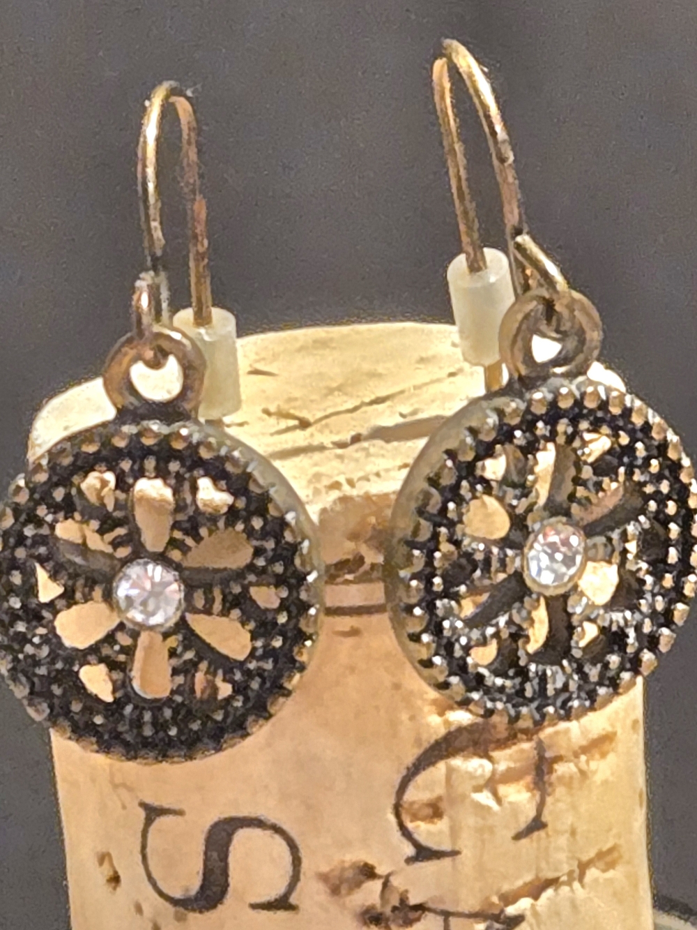 Gold-Tone Floral Drop Earrings with Black Accents and Clear Crystal
